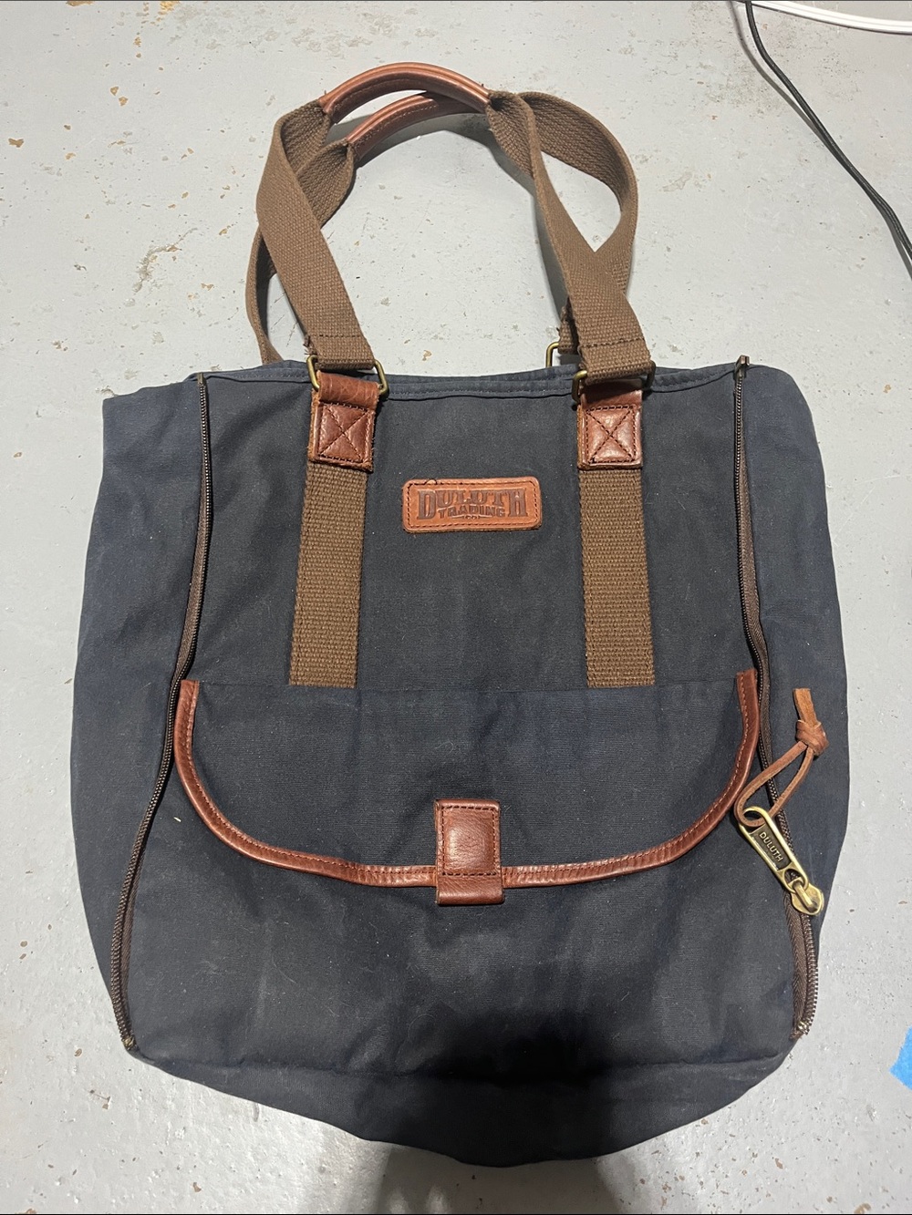 Duluth Trading Co Navy Canvas Tote with Brown Trim and Straps - Picture 2 of 3